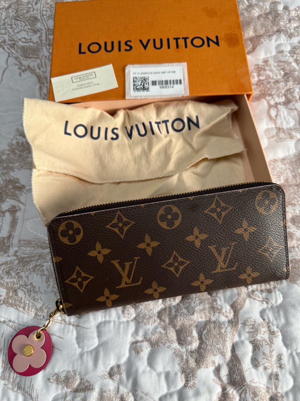 Louis Vuitton Portefeuille Clemence Monogram Round Long Wallet with Flower Charm